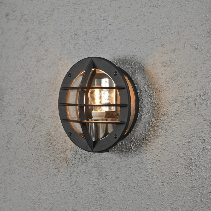 Oden vegglampe utendørs IP23 m/stikkontakt - Svart/klart glass